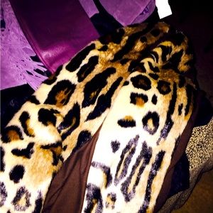 Fur leopard coat jacket.  Topped off ball gown.  Beautiful.